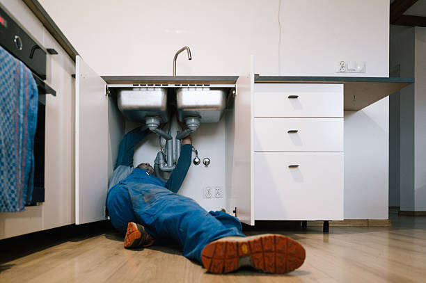 Professional Plumbing technician working in Rock Hall, MD